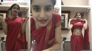 Cute cam girl Saree flaunts her body in a navel-baring outfit