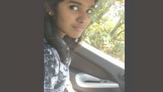 Desi's adorable charm in a car blowjob