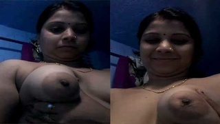 Bhabhi flaunts her breasts and vagina with a cheerful demeanor