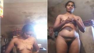 Busty Indian babe strips down to nothing and teases her lover with her naked body