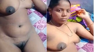 Busty Indian bhabhi bares her assets in a village setting