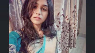 Indian cutie plays with her boobs in MMS video
