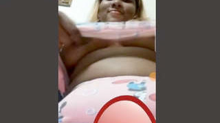 Busty girlfriend flaunts her assets in a live video call