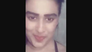 Cute girl flaunts her perky tits in solo video