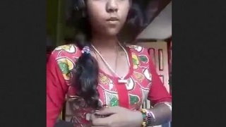 Young Indian girl explores her body with her fingers