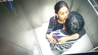 Spy on a hot couple getting it on in a lift