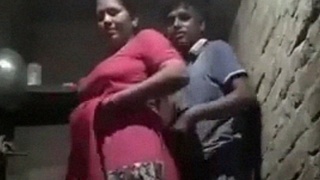 Indian woman has sex with a young rural boy in XXX video