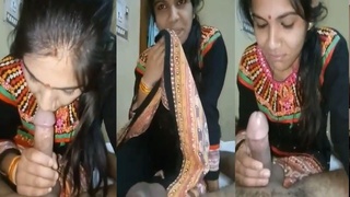 Desi wife gives a blowjob to her husband on camera