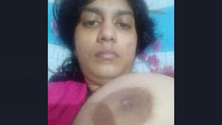 Indian woman flaunts her ample bosom