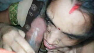 Indian neighbor Bhabi gives a steamy blowjob to her lover