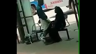 A mature woman from Kerala strokes a penis in a bus stop