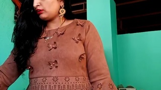 Watch this curvy Indian bhabhi flaunt her breasts and butt in a steamy video