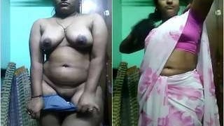 A stunning Indian girl strips and flaunts her breasts and intimate areas