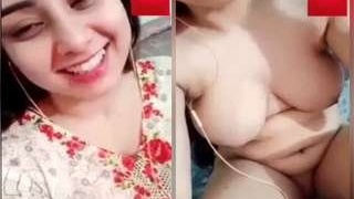 Busty Pakistani babe reveals her breasts and pussy