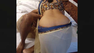 Watch as a desi bhabhi gets romantic with her husband in front of her