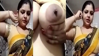 A South Asian mother displays her vagina and anus