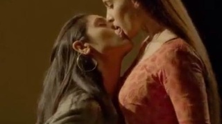 Sensual lip-locking between Indian lesbians in a steamy video