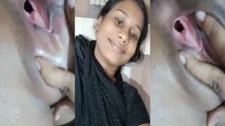 A mischievous girl reveals her bare genitalia on camera in a public bathroom
