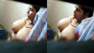 Amateur Desi Bhabhi's private bathing session caught on camera