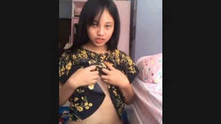 Beautiful girl shows off her body in a steamy video
