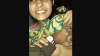 Lover squeezes GF's breasts with force