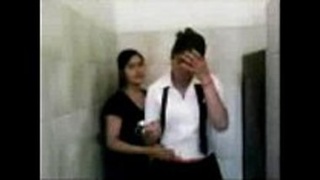 Two Indian girls indulge in passionate kissing during a fitness class