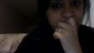 Indian girlfriend with huge boobs seductively plays for the camera