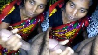 Watch this exclusive video of a Desi bhabhi giving a handjob in the village