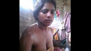 College girl takes a nude bath in front of the camera