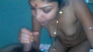 Indian bhabhi gives a handjob and oral sex to her brother-in-law, resulting in a satisfying climax