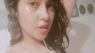 Bathroom selfie of wet Indian teen