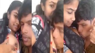 Watch a Tamil babe suck and squeeze boobs in this erotic video
