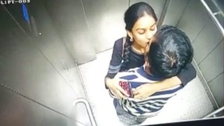 Spy on a hot couple in an internal lift