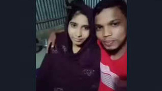 A village girl from India films herself for a video