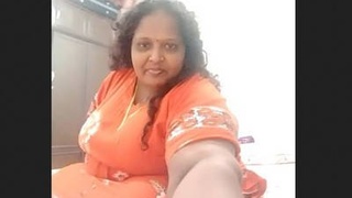 Curvy Indian aunty flaunts her big boobs and wet pussy