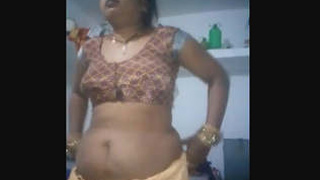 Indian bhabhi flaunts her breasts and pussy