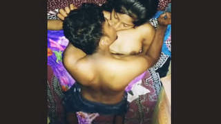 Watch a stunning couple share intimate moments in this video