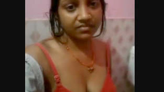 Desi call girl flaunts her big boobs and shaved pussy