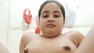 Watch a stunning Indian girl in the bathroom, completely naked
