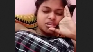 A seductive girl indulges in a video call romance with her boyfriend