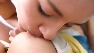 Teenage lesbian enjoys nipple play