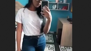 Teen takes a nude selfie in front of the mirror