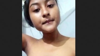 Naked Indian teen shows off her body in solo video