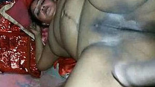 Indian aunt with big breasts gives her husband a hard time in bed