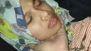 Intimate moment between Indian couple with black partner