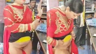 Indian woman strips naked and asks for donations