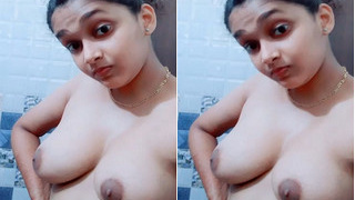 Exclusive video of a cute Indian girl exposing her breasts and vagina