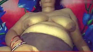 Aunty Sougandha indulges in self-pleasure and sucks a big cock