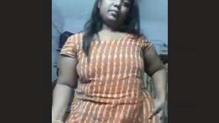 Mature Bhabhi continues to pleasure herself with her fingers in part 2