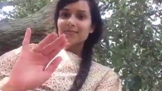 Beautiful Indian girl in nature strips down and masturbates